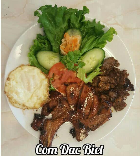 Grilled pork rice plate with a fried egg